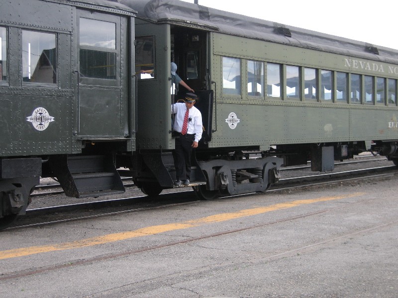 Tour passenger car and conductor