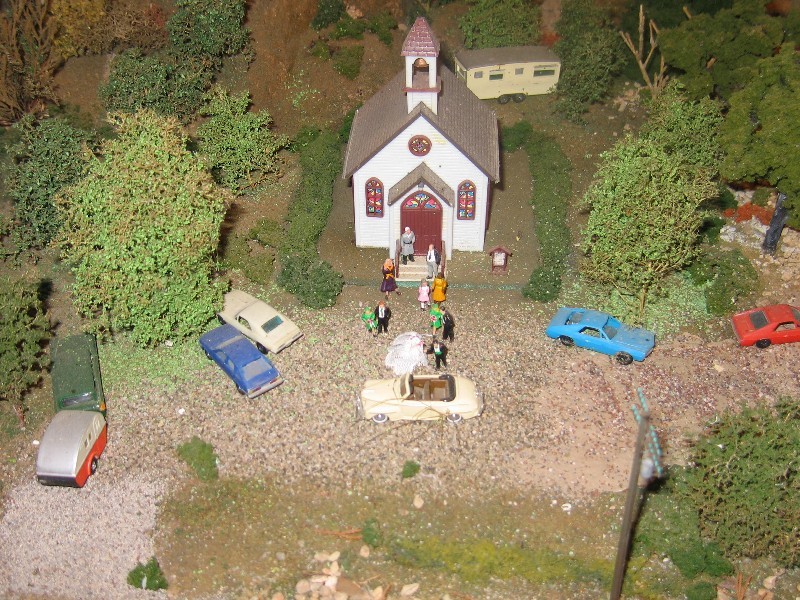 The layout is quite extensive with a high level of detail...a wedding party coming out of church.