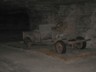 Old vehicles are brought down in sections and then converted to electric motors for transportation in the mine. 