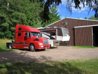 Tige & Red Rover next to the horse barn